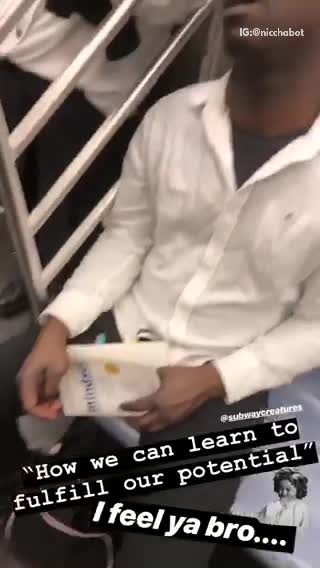 Guy reading mindset book but asleep on subway