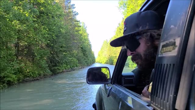 IN A 4RUNNER DOWN BY THE RIVER