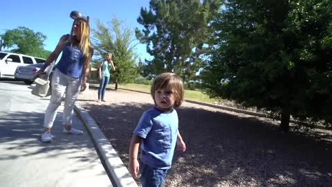 Giant dog happily babysits his favorite human