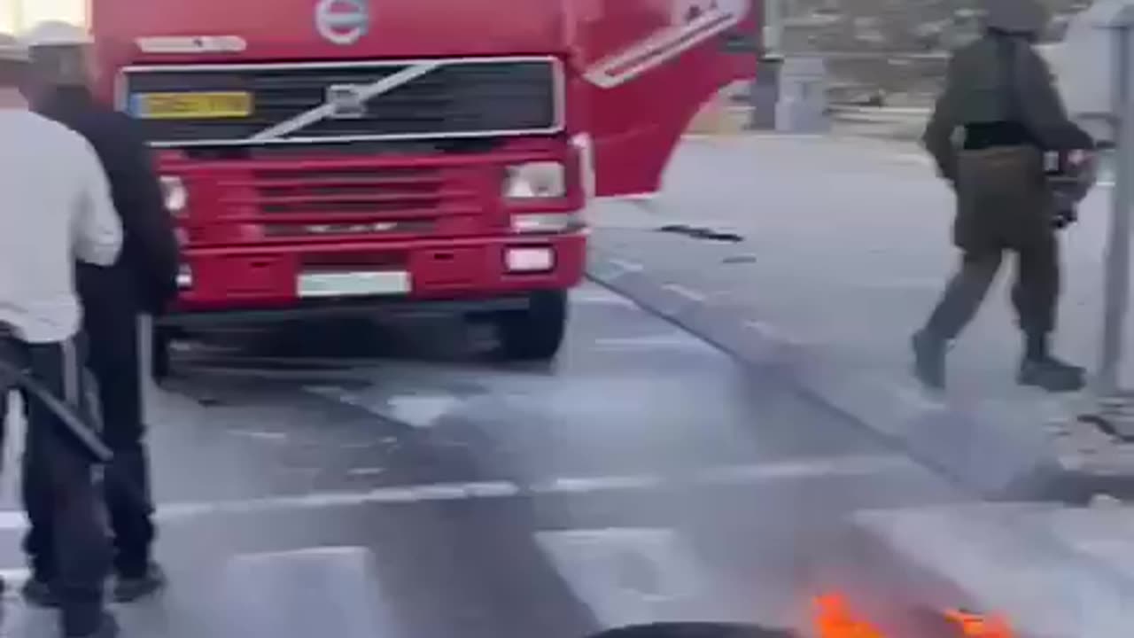 Israeli Settlers Attacking Aid Truck And Beating The Driver