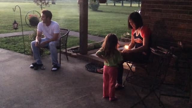 Sparkler Lands In Daddy's Lap