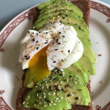 TASTY YOLK LAVA OVER AVOCADO TOAST