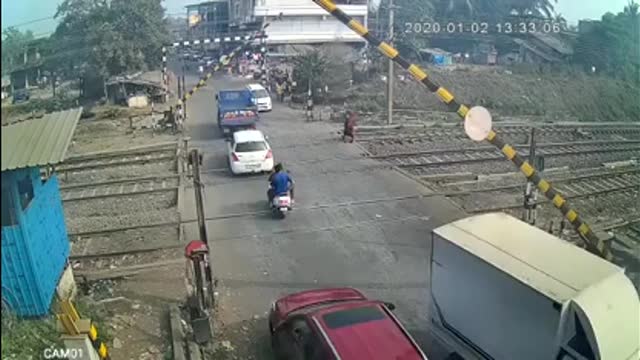 A Devastating crash at a railway crossing in India
