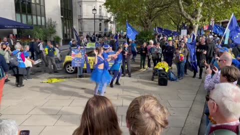 Blue people dancing in Westminster