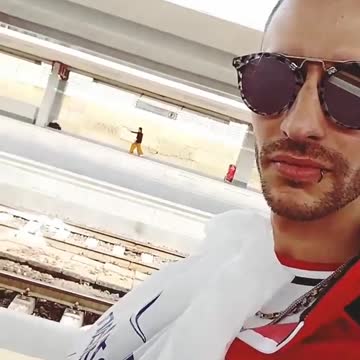 Man in red records person training