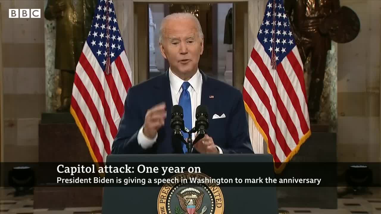 Biden attacks Trump's 'web of lies' one year after Capitol riot