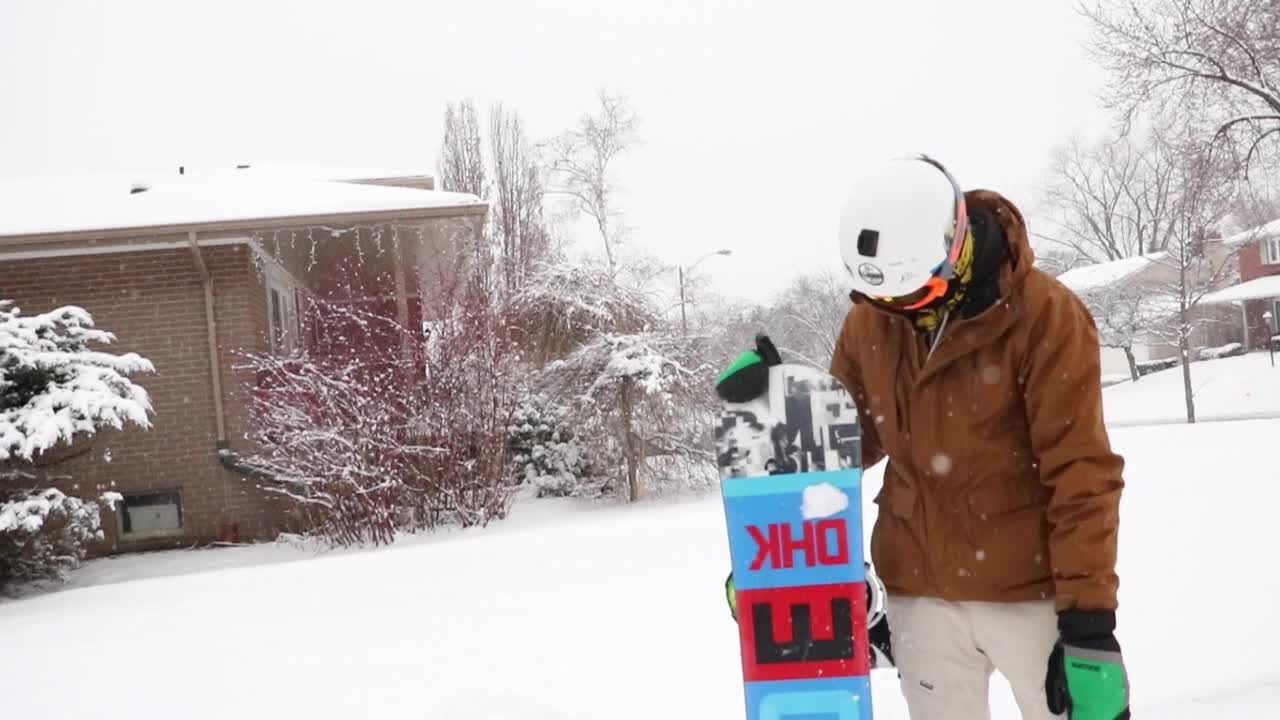 Snowboarding throughout the city of Toronto