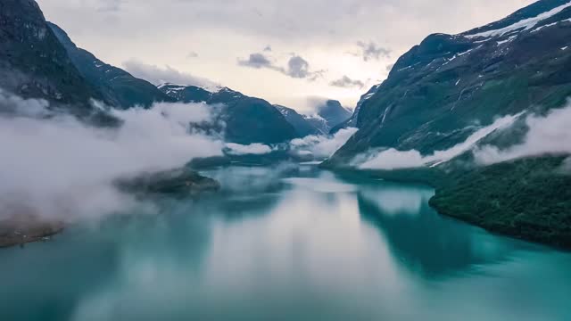 beautiful nature norway natural landscape lovatnet lake flying over the clouds