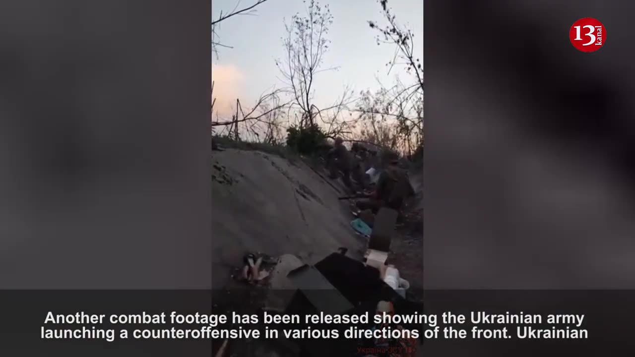 Ukrainian fighters parade fierce trench battle waged at a close range