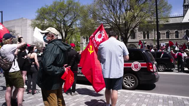 Anti-Israel protestors in Canada and some with communist flags