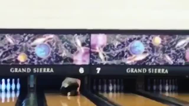 Guy runs down bowling lane for one pin fail