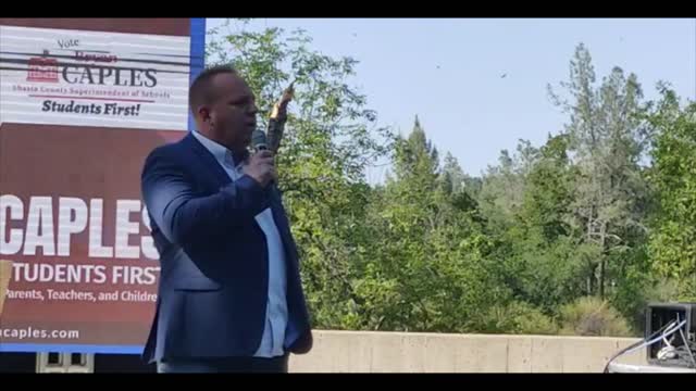 Bryan Caples speaks at the Rally on the River