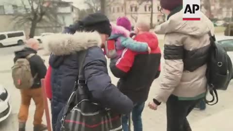 Ukrainians fleeing war arrive by train in Poland