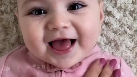 Cute Baby Playing with Mom