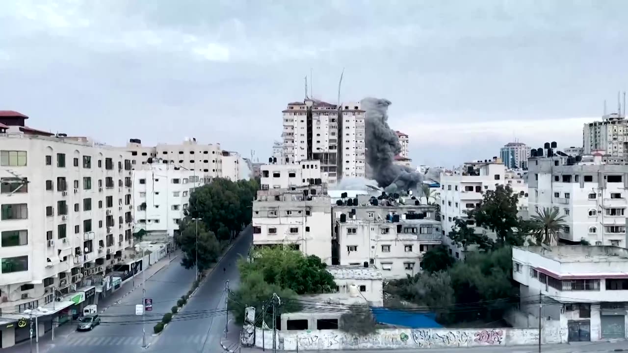 Gaza buildings collapse after Israeli air strike