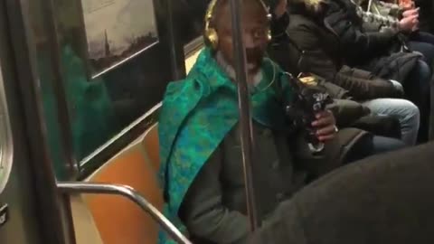 Man on subway train says if he gets locked up give him some milk and cheese