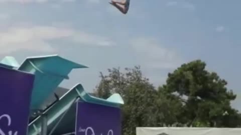 Big slide back flip fail into pool