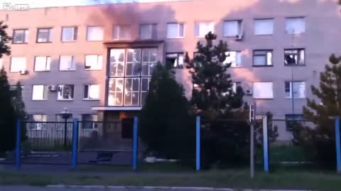 Ukrainian Nazis shoot up a building for fun