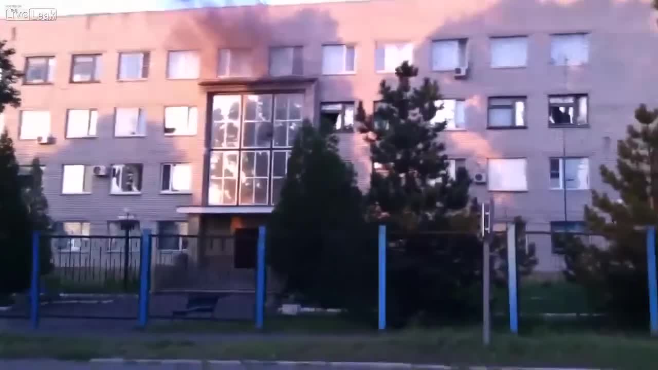 Ukrainian Nazis shoot up a building for fun