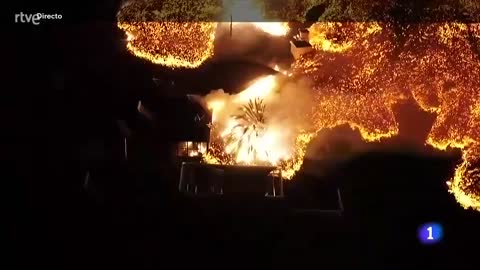 River of lava flowing on the Spanish island of La Palma after new Strombolian explosions tonight