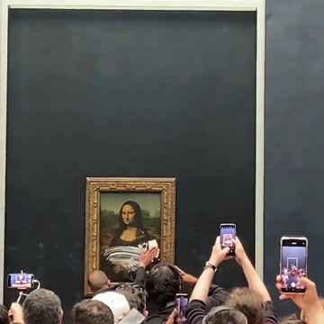Climate Radical Attacks Mona Lisa Painting at the Louvre in Paris