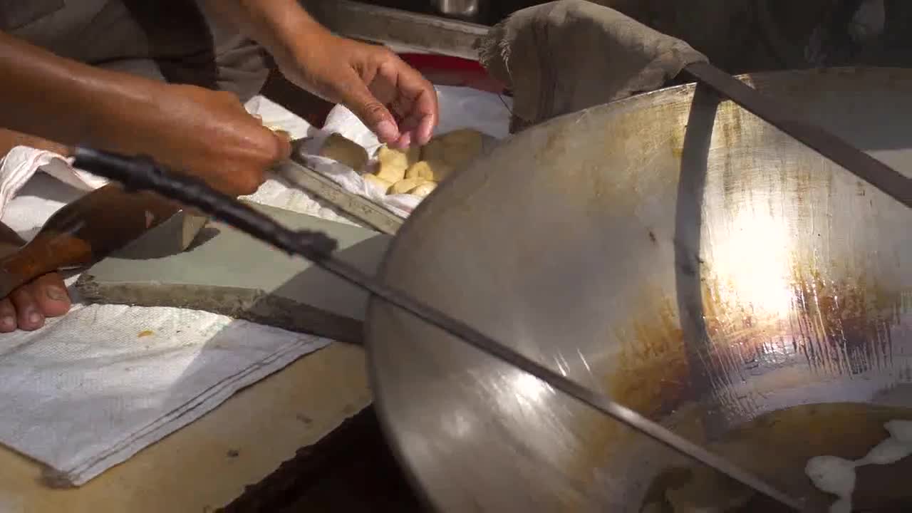 Man Preparing Indian Street Food