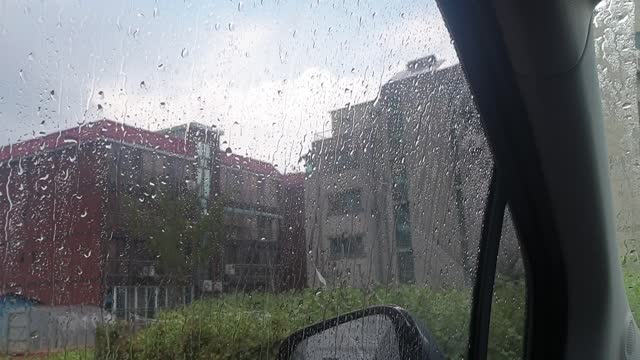 watching the rain in the car
