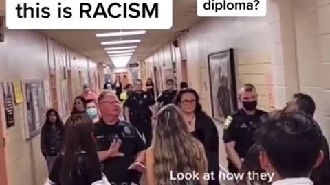 Kid doesn't get his diploma because racist school doesn't want him flying the flag of his people