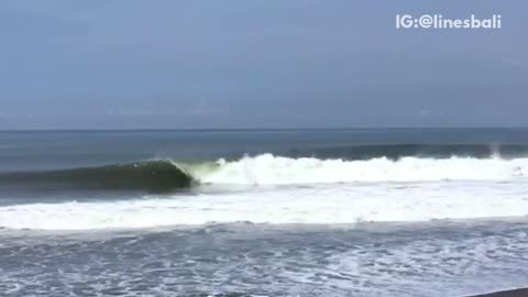 Guy surfs then surf in reverse