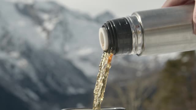 Pouring a Hot Drink on a Cold Day