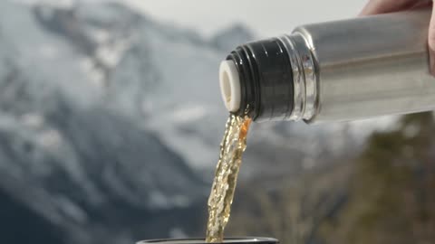 Pouring a Hot Drink on a Cold Day