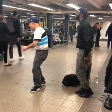 White polo strips dancing subway guy rapping singing