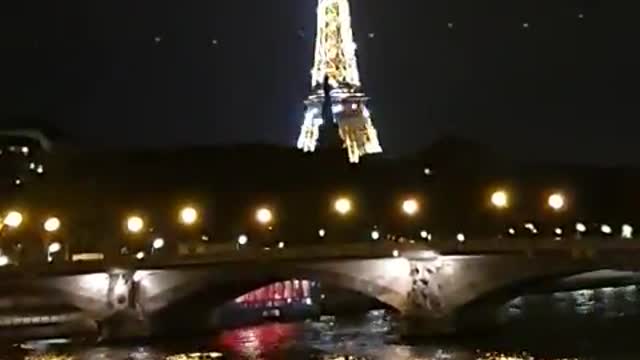 At night, the Eiffel Tower in Paris