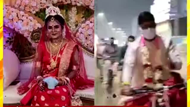 New groom on the roof of the bicycle! After the dhoti-Punjabi, the bride and groom cycled