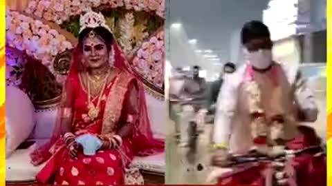 New groom on the roof of the bicycle! After the dhoti-Punjabi, the bride and groom cycled