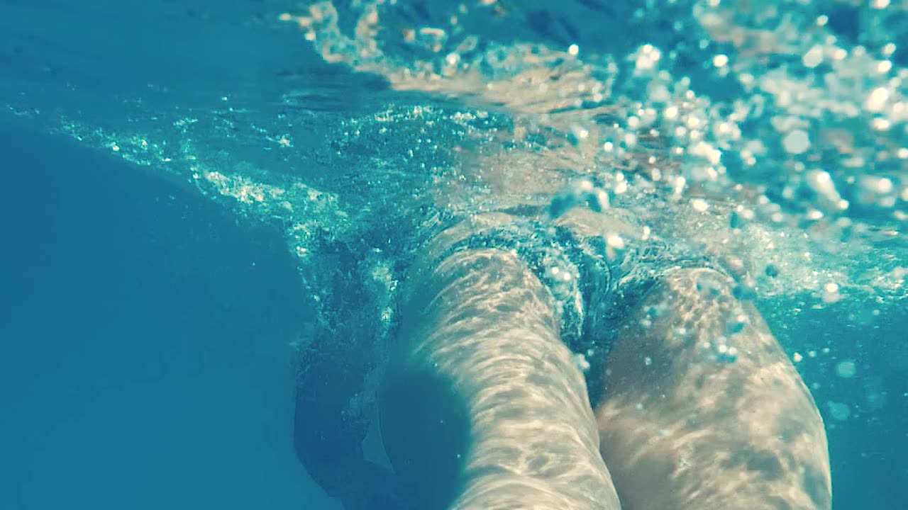 woman swimming in a pool