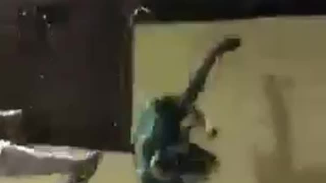 Guy jumping on table and breaking it