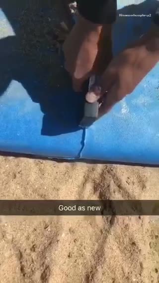 Good as new guy repairs blue surfboard stapler