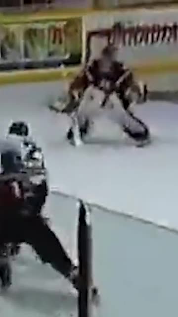 Matt Petgrave raises skate to sideswipes another player on the ice