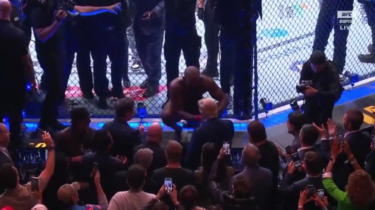 JON JONES GIVES TRUMP BELT