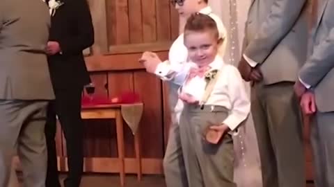 Kid add some comedy to a wedding! - Ring Bearer Fails