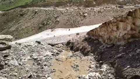 The water comes out from the snowy underground