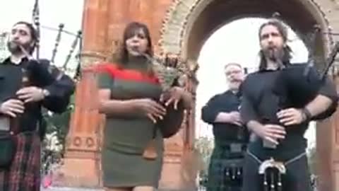 A lady who plays the bagpipes amazingly
