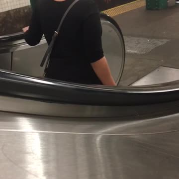 Woman on wrong side of elevator