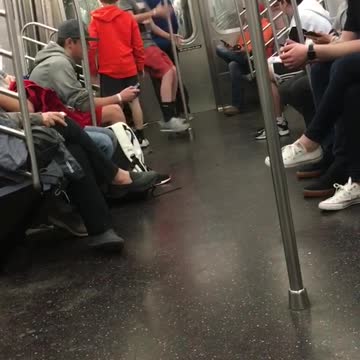 Three white kids try to do worm dance on subway