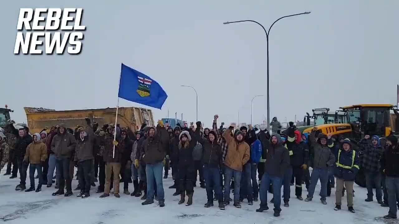 🇨🇦 Truckers chant as they await the RCMP that can't keep up with them!