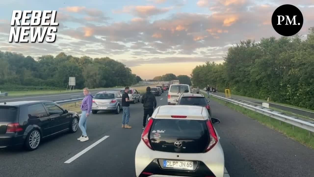 A group of Farmers protesting on the highway in front of the Germany/Holland Border.