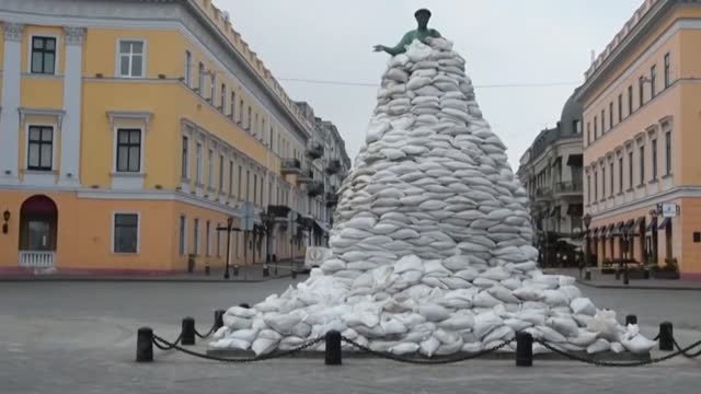 Ukrainian soldiers protect statues and monuments in the port city of Odessa