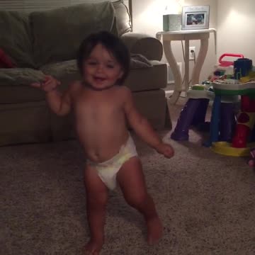 Baby walks into mommy