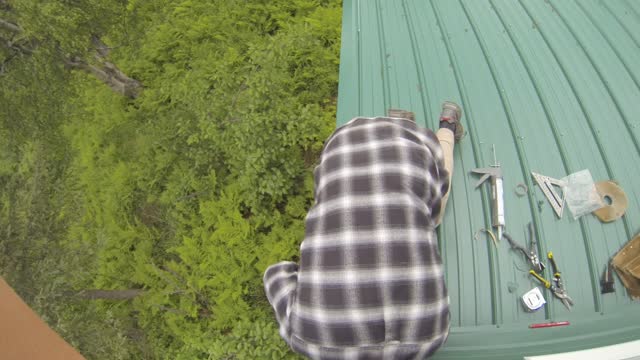 Planting raspberries in Alaska, working on the roof, splitting firewood